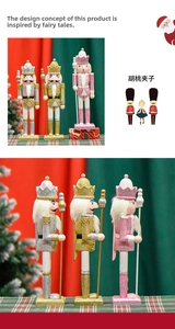 Close-up of three 30cm wooden nutcracker kings with glitter finish for Christmas decor