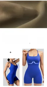 Detail of seamless blue athletic bodysuit with close-up on breathable knit texture