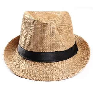 Detail of classic straw fedora hat featuring woven texture and black ribbon band