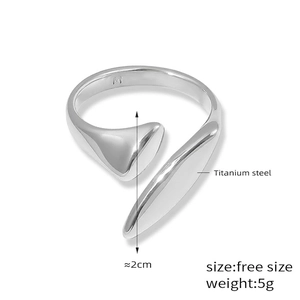 Detail view of silver titanium steel open ring with geometric design weighing 5g