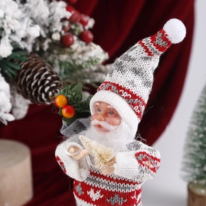 Close-up of knit texture and facial details of a standing Santa Claus Christmas figurine