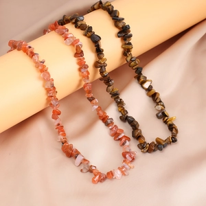 Summer vacation style necklace featuring natural irregular red agate and tiger eye stones