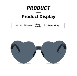 Detailed view of gray one-piece heart-shaped sunglasses with matching gray frames and lenses