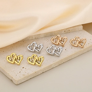 Interlocked double heart earrings in gold, silver, and rose gold with small diamonds