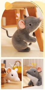 Close-up of soft plush mouse doll showing realistic grey fur and cute pink inner ears