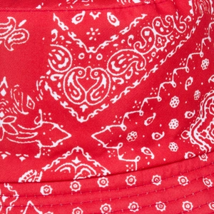 Detailed macro view of high-quality red paisley bandana fabric on a summer bucket hat
