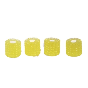Detail view of four yellow resin miniature corn models for DIY landscape decoration