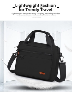 Macro view of a lightweight black business laptop bag with orange fashion logo