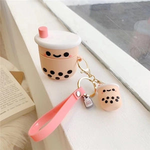 Pink pearl milk tea silicone case detail with mini pendant and matching wrist strap