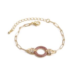 Hip Hop gold chain bracelet featuring a round centerpiece with pink cubic zirconia stones