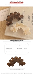 Détail de la pince à cheveux en acétate avec motif écaille et dimensions de 10 cm