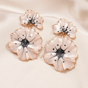 Vintage double-layered beige enamel ginkgo flower earrings on soft silk backdrop