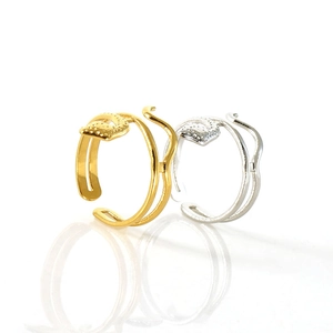 Adjustable 18K gold and silver snake ring with textured grain finish for women