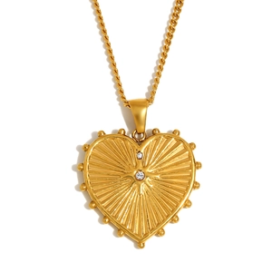 18K gold plated stainless steel heart pendant necklace with rhinestones on white backdrop