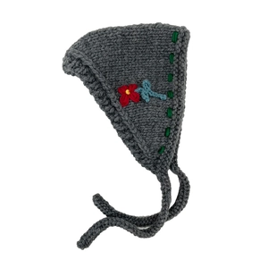 Handmade dark grey knitted flower headband with red embroidery and warm ear protection