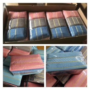 Bulk pack of thick cotton towels in pink, grey, and blue with gold stripe accents