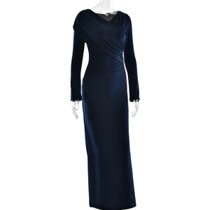 Detailed view of the V-neck pleated bodice on this elegant deep blue evening gown