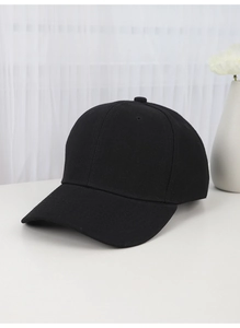 Detailed close-up showing the smooth black cotton texture and craftsmanship of the baseball cap