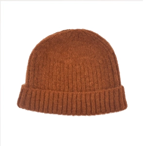 Winter caramel knit beanie hat with thick vertical ribbed pattern and wide cuff