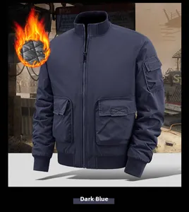Detail of dark blue padded flight jacket showing quilted lining and ribbed cuffs
