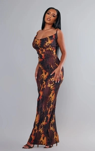 Close-up of abstract floral pleated fabric on a slim fit maxi dress for women