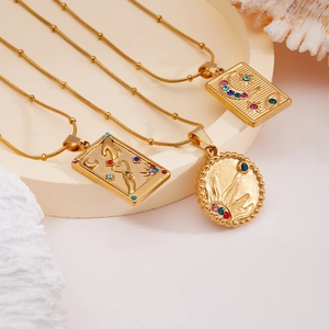 Gold titanium steel tarot necklace set with sun, moon and heart pendants with colorful rhinestones