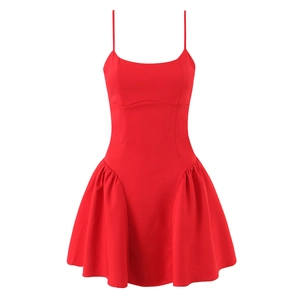 Fashionable red mini dress with slim waist and spaghetti straps on white background