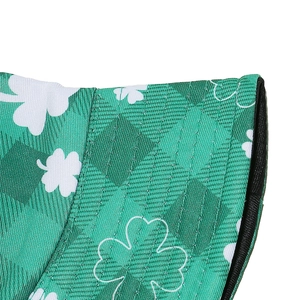 Detailed macro view of St. Patrick's clover print on green plaid fabric bucket hat