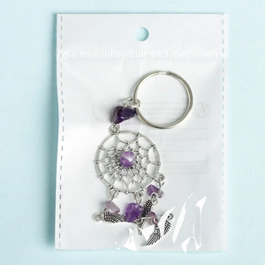 Silver dreamcatcher keychain featuring natural purple amethyst beads and metal feathers