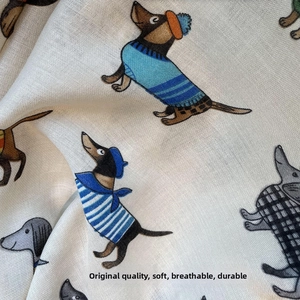 Detailed macro view of soft breathable linen scarf fabric with cute dachshund dog pattern
