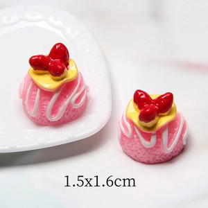 Miniature resin strawberry cakes for DIY crafts with bow and cream details
