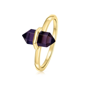 Detail of a minimalist gold ring featuring a hexagonal purple crystal gemstone