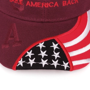 Embroidered burgundy baseball cap featuring Make America Back text and US flag brim design