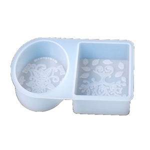 Blue silicone mold for soaps with intricate floral patterns in round and rectangle shapes