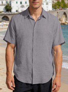 Close-up of a men's grey short-sleeved shirt with breathable cotton-linen texture