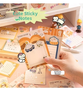 Detalle de notas adhesivas con dibujos de astronautas y osos, block de 30 hojas cada uno