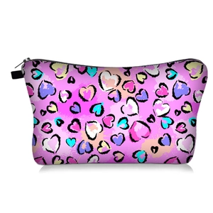 Pink makeup bag with colorful digital heart prints and top zipper closure