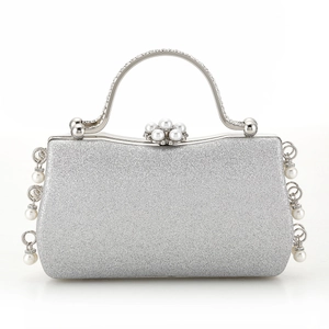 Silver glitter evening clutch bag with pearl floral clasp and rhinestone metal handle