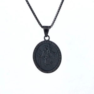 Detail of Saint Christopher medal in black finish with embossed protect us text and box chain