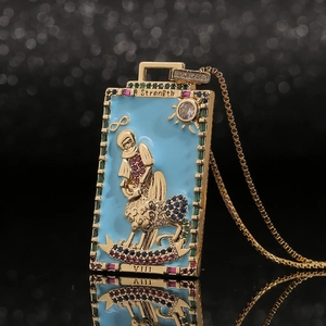 Gold tarot strength pendant necklace with blue enamel and colorful zircon stones