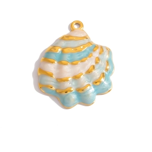 Detailed macro view of light blue and white enamel shell pendant with gold edges