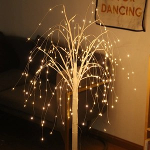 Decorative LED birch tree light with warm glowing branches for cozy home holiday decor