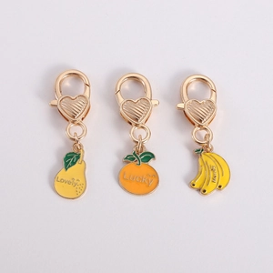 Detail of zinc alloy fruit charms with enamel finish and heart lobster clasps
