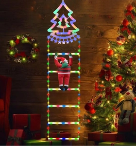 Close-up of colorful LED climbing ladder and plush Santa Claus on a dark wood wall