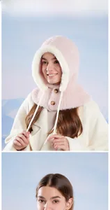 Detail of pink plush balaclava hat with white fleece trim and wooden buttons