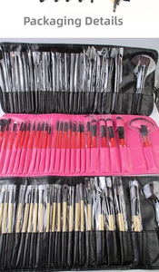 Three professional 24-piece makeup brush sets in black and wood finishes with storage bags