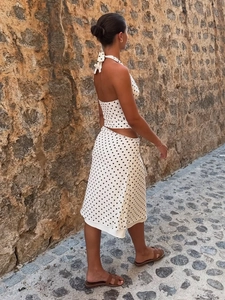 Summer polka dot two-piece set with halter backless top and side cutout midi skirt