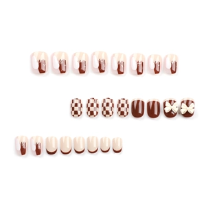 Set unghie finte stile Maillard francese con motivo a scacchi e fiocco 3D crema