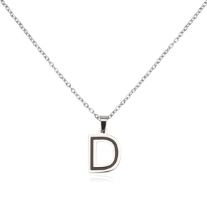 Macro shot of stainless steel letter D pendant with black enamel inlay on silver chain