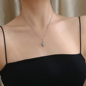 Minimalist shell and pearl pendant necklace in silver stainless steel for women